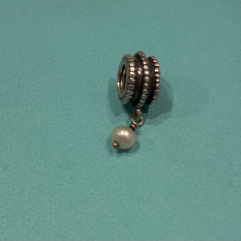 Pandora Silver bead with Pearl charm. Retired.